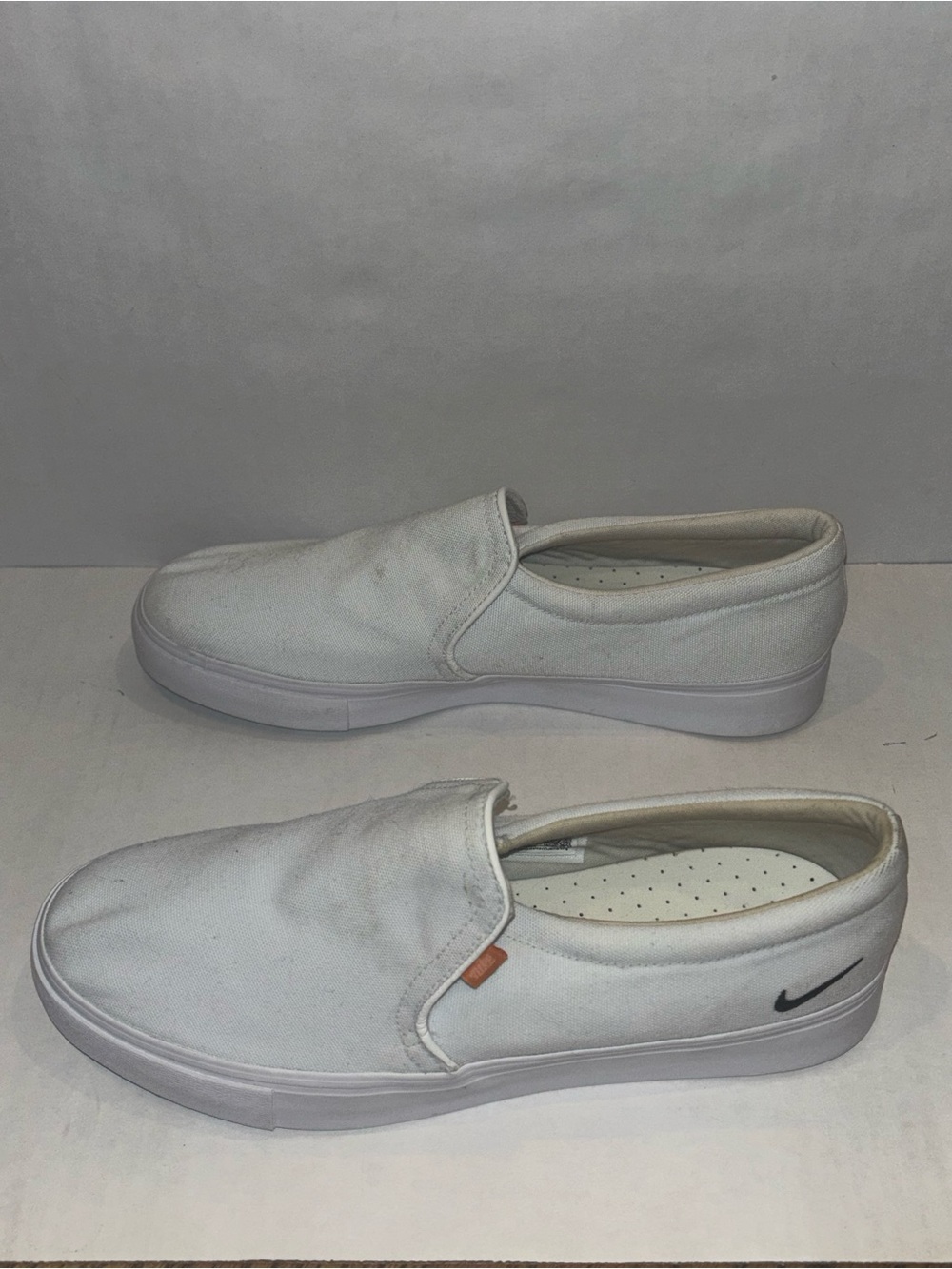 Nike White Canvas Slip-On Loafers with Black Swoosh